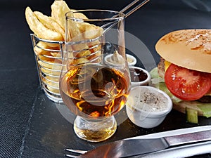 Drink alcohol bar beverage burger sauces blackplate blackbackground eat photo
