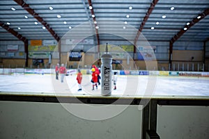 Drink bottle on board ice hockey rink