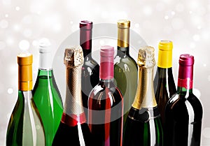 Alcohol drinks bottles on light background