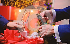 Drink champagne or sparkling wine. Celebrate new year with champagne. Last minute before new year. New year countdown