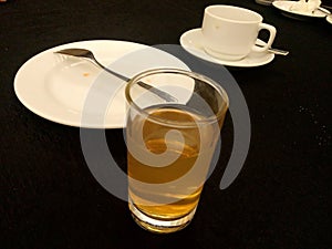 Drink and food on the table in restoran hotel and black table