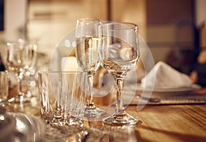 Drink, glass and dinner with party, celebration event with glassware, elegant and luxury in restaurant or banquet. Table
