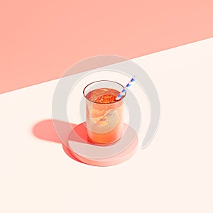 Drink in glass with ice and straw on beige background, 3d render