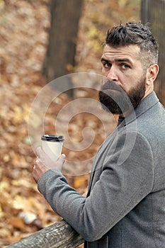 Drink it on the go. Man bearded hipster prefer coffee take away. Businessman bearded guy drink coffee outdoors. Hipster