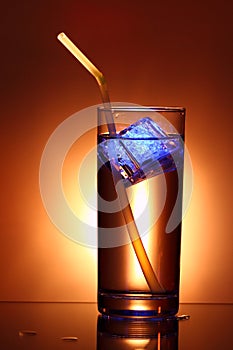 Drink with illuminated ice