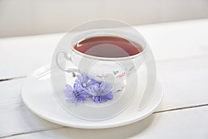 A drink made of chicory. Cichorium intybus, the flowers of which are usually called blue sailors, chicory, coffee grass