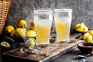 Drink Michelada chilena. Traditional Latin American chilean mexican refreshing beer drink with lemon, salt and ice photo