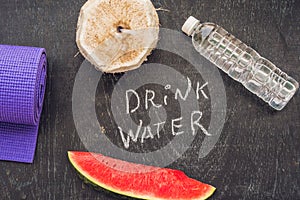 Drink more water - hydration reminder - handwriting on On a chalk board