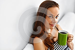 Drink Morning Coffee. Woman Drinking Beverage In Bed. Healthy Lifestyle