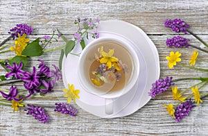 Drink with natural herbs. Floral tea arrangement