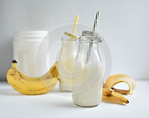 Drink with protein,Healthy drink, gourmet drink, smoothie, kefir with  and protein, milk with , white drink in clear bottles, cock