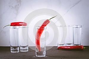 Drink set with shots of vodka and red pepper/Drink set with shot