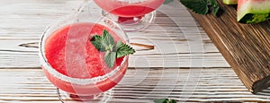 Drink smoothies from red watermelon in glass dishes