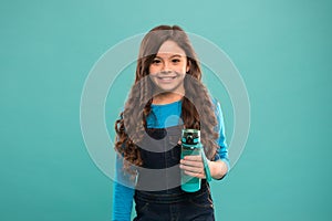 Drink some liquids. Water balance concept. Strong and healthy child. Living healthy life. Health and water balance. Girl