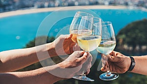 Drink three glasses white wine in friends hands outdoor seascape holidays, romantic couple toast with alcohol, happy people cheer