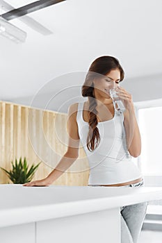 Drink Water. Happy Smiling Woman Drinking Water. Healthy Lifestyle. Health, Diet Concept.