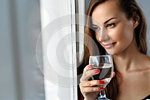 Drink Water. Smiling Woman Drinking Water. Diet. Healthy Lifestyle