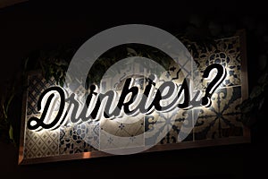 Drinkies sign, light up at dark sign for bar area photo