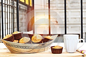 Drinking arabic coffee and muffins or madeleine outdoor