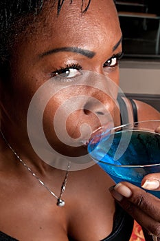 Drinking blue martini