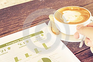 Drinking coffee latte reading company business factsheet statistic