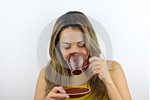 Drinking a cup of coffee