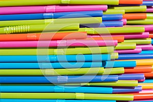 Drinking straws closeup, colorful plastic straw macro