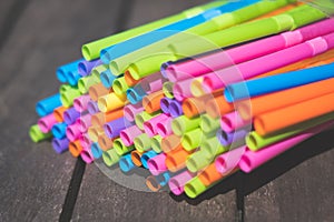 Drinking straws closeup, colorful plastic straw macro photo