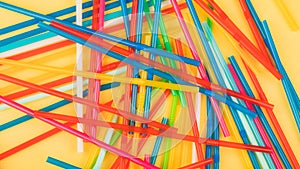 Drinking straws for colored background. Colorful plastic straws