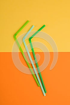 Drinking straws for colored background. Colorful plastic straws
