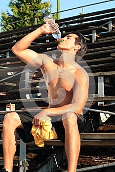 Drinking Water On Bleachers