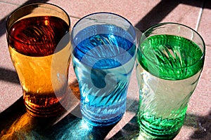 Drinking Water in Colorful Glasses