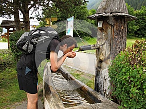 Drinking water at fountain