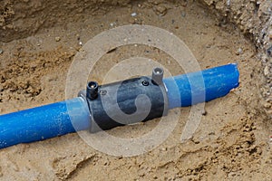 Drinking water line with connecting sleeve