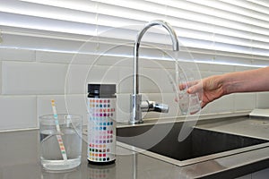 Drinking water test kit on home kitchen counter