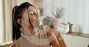 Drinking water, yoga or Indian woman in home with health, fitness or wellness for natural hydration. Thirsty female