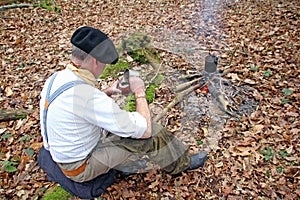 Drinking yerba mate in woods photo