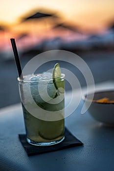 Drinks at the beach at sunset