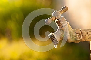 drip of water appearing at end of faucet