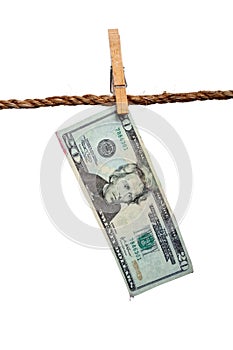 A dripping 20 dollar bill on a clothesline