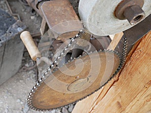 Drive chain with gears. Old grinding wheel.