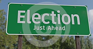 Drive past election just ahead green road sign.