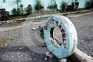 Drive Safely in old white tire