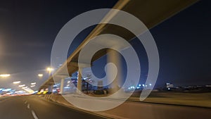 Drive on Sheikh Zayed Road in Dubai at night, United Arab Emirates timelapse