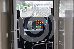 driver cabin Control Panel of High-Speed Train from Flat Angle During Daytime