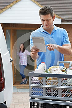 Driver Delivering Online Grocery Order To House