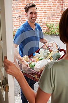 Driver Delivering Online Grocery Shopping Order