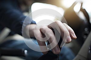 Driver with Hand on Stick Shift