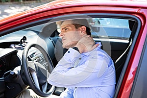 Driver Having Neck Pain After Driving Car