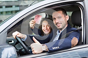 Driver in his car after getting his driving licence